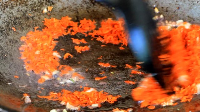 frying shrimp paste or kapi with onion