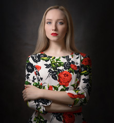 Portrait of beautiful young woman with blue eyes. Studio shot.