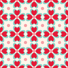 Seamless vector pattern with stylized flowers and hearts. 