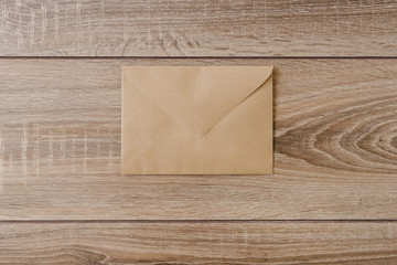 envelope on a wooden background