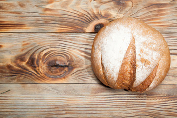 Bread on a rustic wooden background