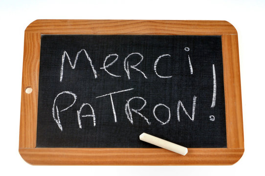 Merci patron &eacute;crit sur une ardoise