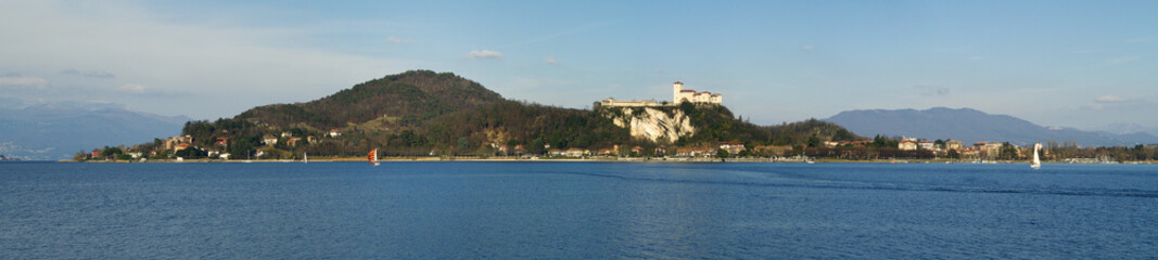 Fototapeta na wymiar lago maggiore con rocca di angera e montagne italia europa italy europe