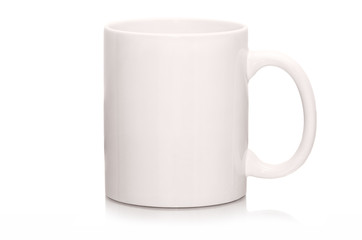 White mug empty blank for coffee or tea isolated on white background. White cap with shadow