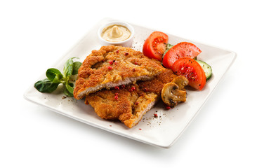 Fried pork chop and vegetables