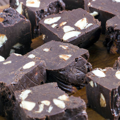 Homemade nut fudge on wood board