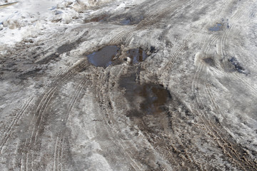 In the spring the snow on the road melted and turned to water and dirt obstructing the movement and...