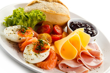 Breakfast - boiled egg, bacon, cheese and vegetables