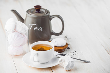 delicate white pink marshmallows with fragrant tea
