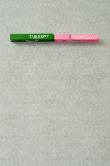 Tuesday and wednesday written on cloth pegs