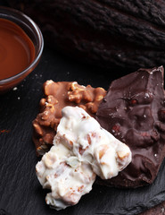 Melting chocolate and diffrent bars - stack and chips with choco