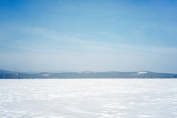 Fototapeta na wymiar landscape of a frozen mountain lake