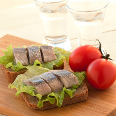 sandwich with herring and tomatoes