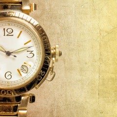 Elegant men's watch on antique paper background.