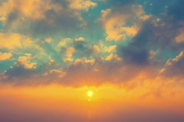Fototapeta premium Beautiful blazing sunset landscape with orange sky and cloud, Amazing summer sunrise as a background.
