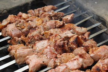 Meat porkis fried on the grill skewers at coals 20454