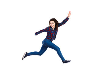 Fototapeta na wymiar Young woman jumping on white background 