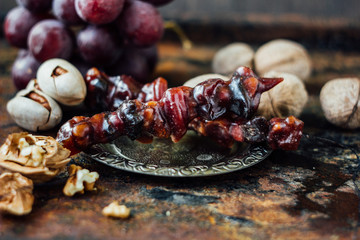 Sweet churchkhela with ingredients.