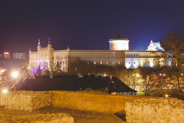 Medieval royal castle in Lublin at night, Poland © vladdeep