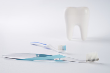 Toothbrush and tooth on Clean toilet, concept dental.