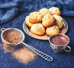 Profiteroles and hot chocolate