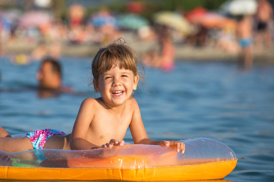 Happy kid enjoying the sea