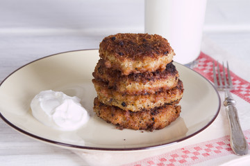 Pancakes oatmeal with cream and ice-cream bowls