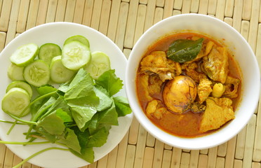 spicy chicken with egg spoiled while being incubated curry in cup
