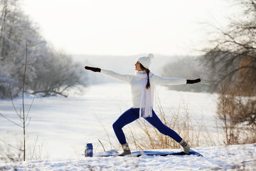 Girl standing in asana outdoors