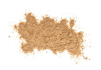 Cinnamon powder on a white background, top view
