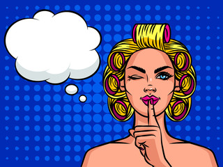 Young beautiful girl European type with curlers on her head holding a finger to his mouth. Housewife with speech bubble over halftone background effect