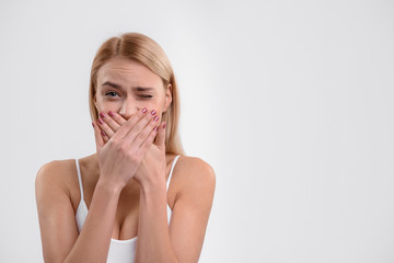 Blond girl is ashamed of her appearance