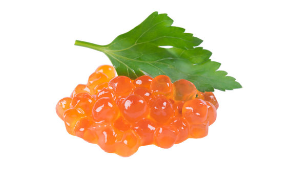 pile of red caviar on a white background with parsley