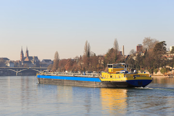 Naklejka premium An anonymous cargo ship on the Rhine in Basel