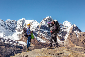 Fototapeta premium People on Hike in high Mountains stay and relax