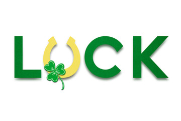 Good luck / Creative St. Patricks Day concept photo of a luck sign made of paper on white background.