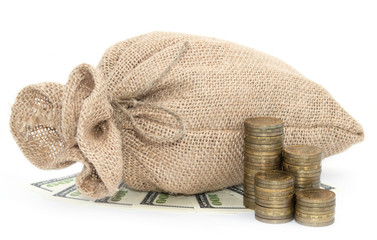 A bag from sacking with dollars on wooden table isolated on white background