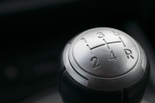 Abstract view of a gear lever, manual gearbox, car interior	