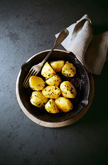 Pan fried potatoes with herbs and spices