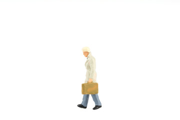 Miniature people businessman on background with a space for text