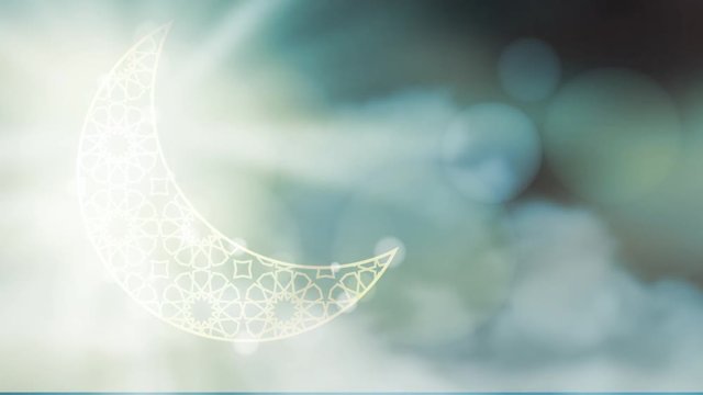 Glittering ornamental moon with moving clouds bokeh effect.  HD graphic animation for muslim holiday holly month Ramadan Kareem.