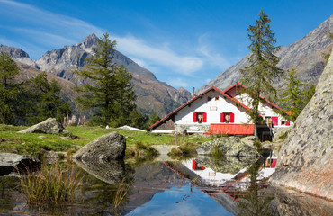 Fototapeta na wymiar Refuge alpine in mountain - Valtellina Landscape - Porro Ventina