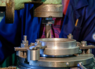 Metal head of machine on factory