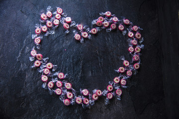 candies on black background
