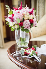 fresh flowers in vases baskets on a table decoration