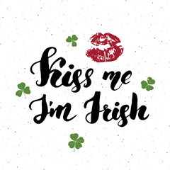 Kiss me, I'm irish. St Patrick's Day greeting card Hand lettering with lips and clovers, Irish holiday brushed calligraphic sign vector illustration.