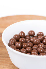Chocolate round beads marbles sweet cookies macro closeup