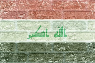 Obraz premium Old Iraq flag on bricks