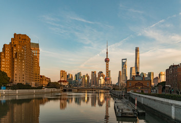 Fototapeta na wymiar View of Pudong, Shanghai, China from the banks of the Wusong River at the golden hour 