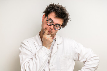 Crazy scientist thinking about his experiment - obrazy, fototapety, plakaty
